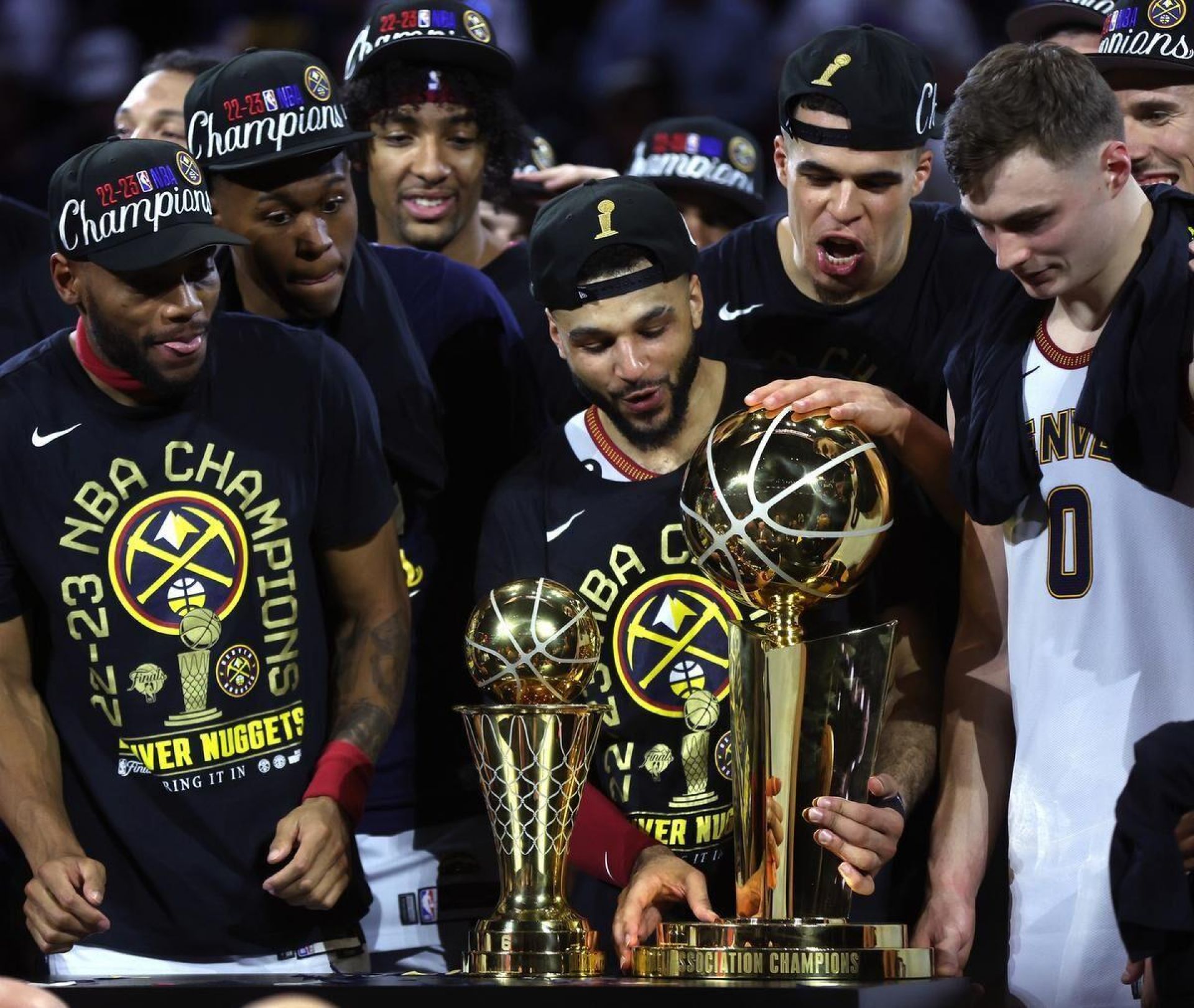 Jamal Murray holding NBA Finals Trophy