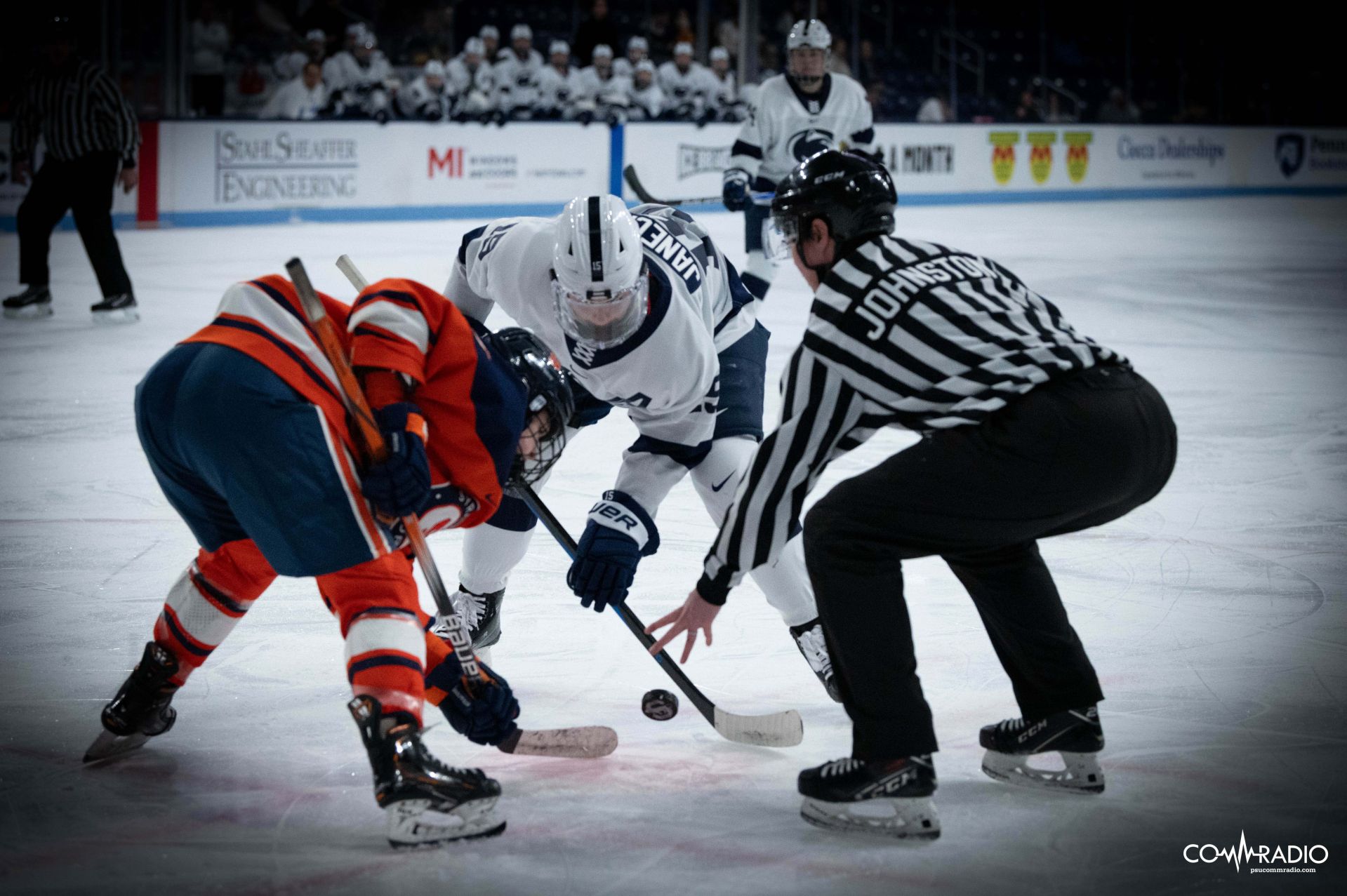 Penn State's Tessa Janecke trying to win a faceoff against Syracuse