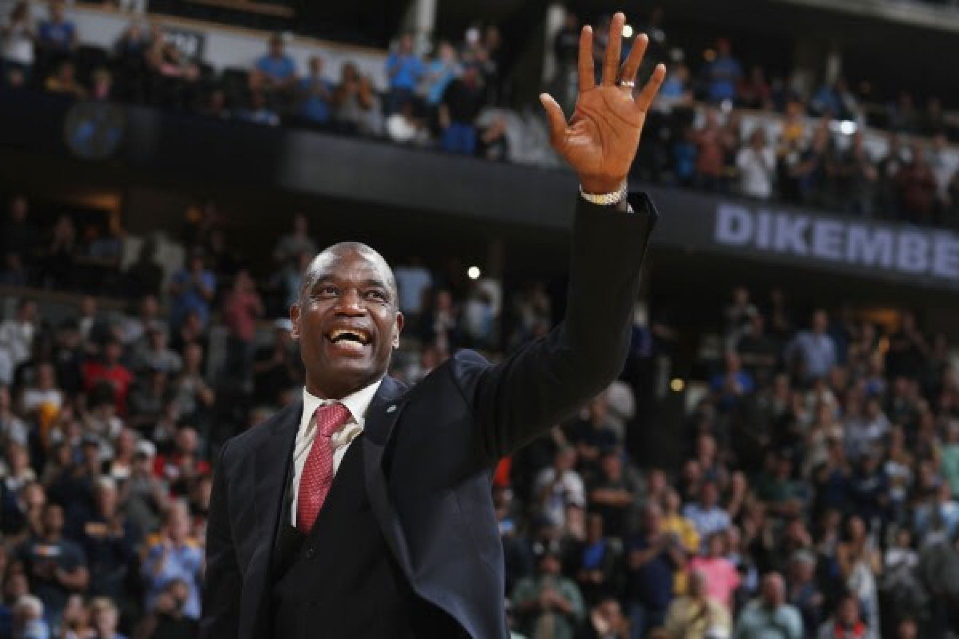 Mutombo waving his hand