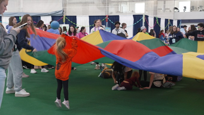 Four Diamond children play with Penn State students at the annual THON Family carnival.