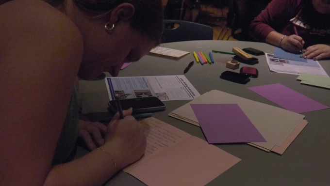 Students wrote cards to soldiers overseas that will go into care packages.