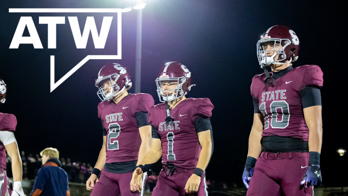 State College players line up for the coin toss