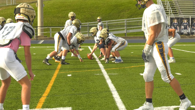 Bald Eagle high school football players on their practice field