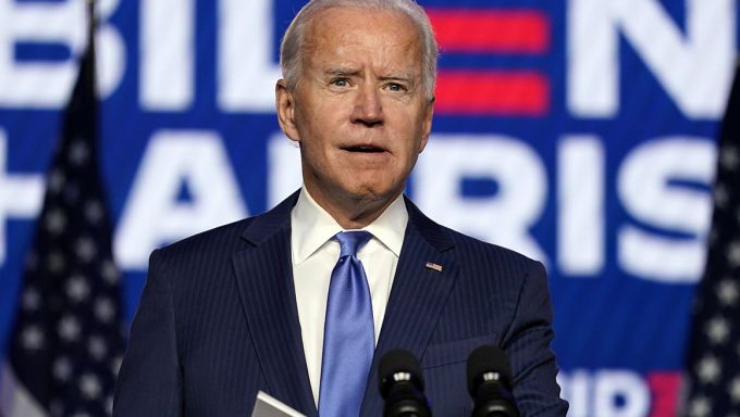 Biden speaking at podium