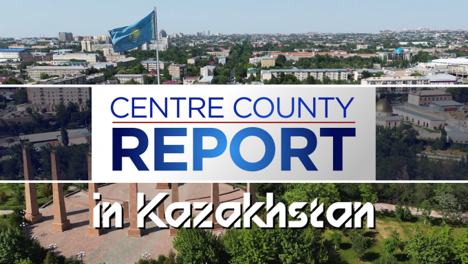 Centre County Report Graphic superimposed on a drone shot of Kazakhstan