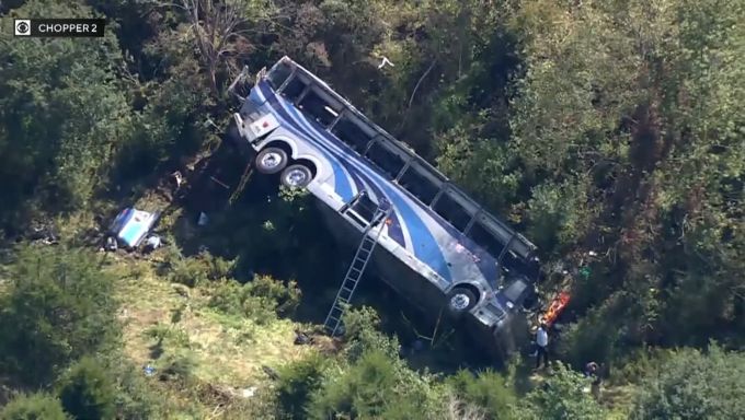 The scene of the bus in the ravine beside I-84