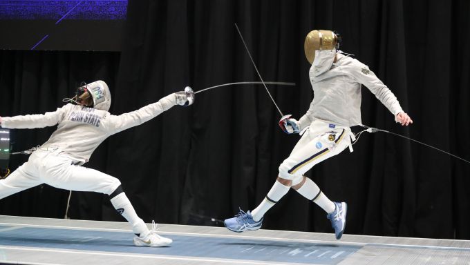 Lilov attempts to touch his opponent with his sabre blade in a bout