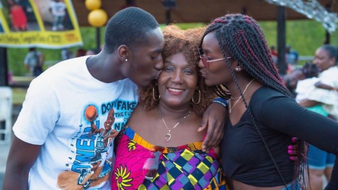 Nathan Osei with his mother and sister.