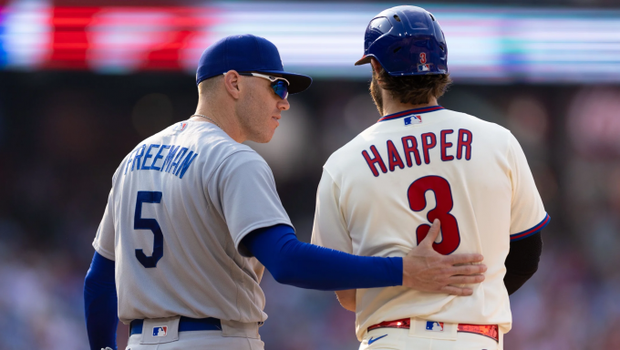 Freeman standing with Harper
