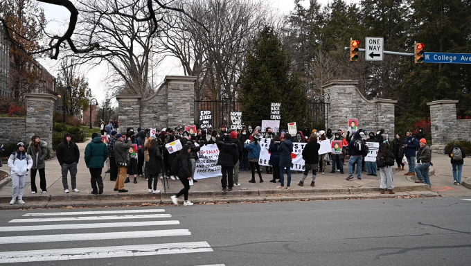 Students and community members gathered at the Allen Street gates in downtown State College for a Palestinian protest.