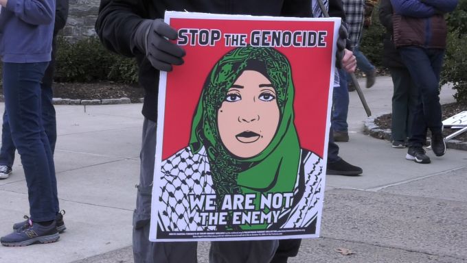 palestinian woman on a poster at a protest