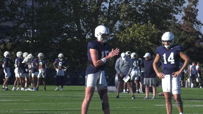 Quarterback Drew Allar practices for upcoming game.