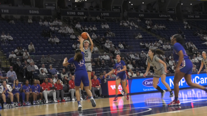 Makenna Marisa takes a fadeaway shot