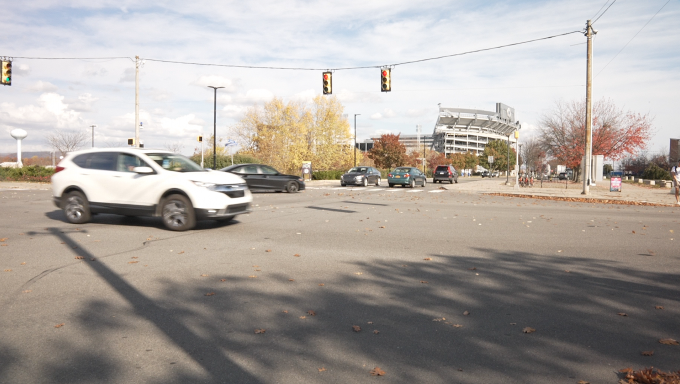 Cars passing Beaver Stadium