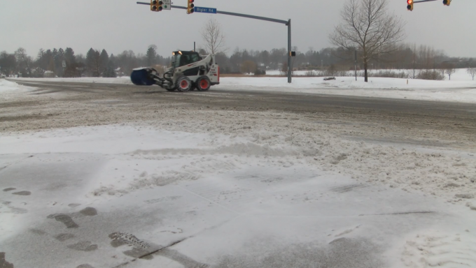 snow cleaner clearing roads at Penn State