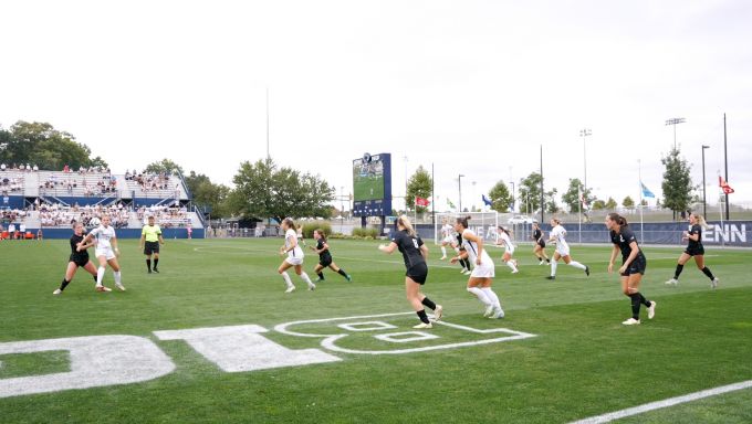 two teams playing soccer