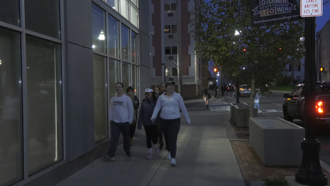 Penn State students walking together for Hillel's walk in solidarity event.