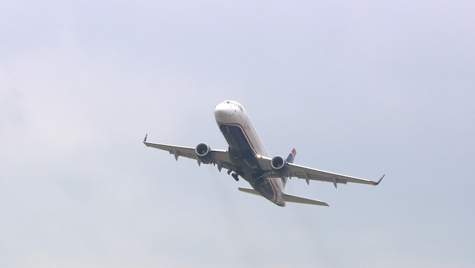 A plane flies overhead