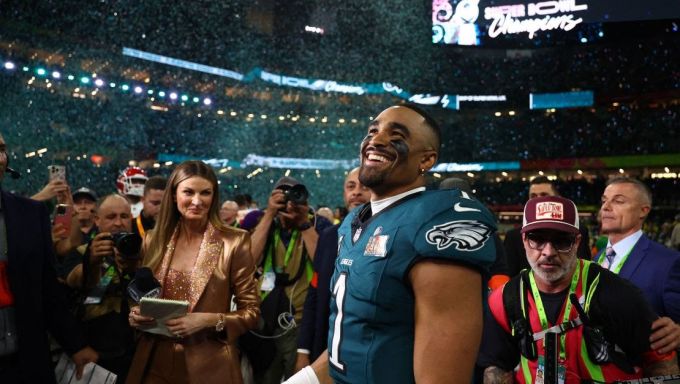 Jalen Hurts walking into the confetti