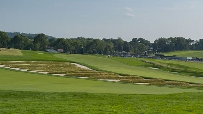A green golf course fairway