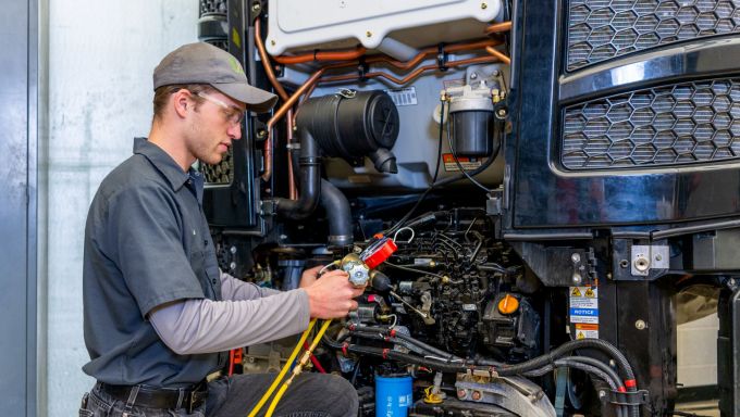 a mechanic working on a automobile