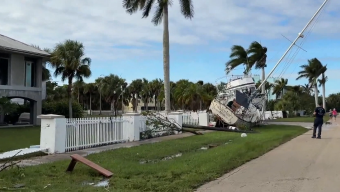 Capsized boat in a neighborhood