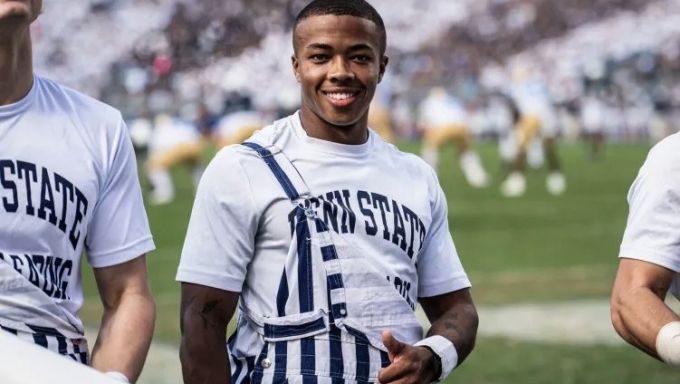 Jordan Frank poses for a photo as the Penn State Mic Man.