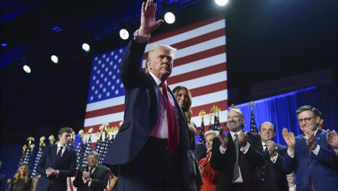 Trump walking off stage after win