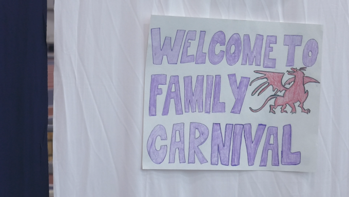 a sign at the family carnival