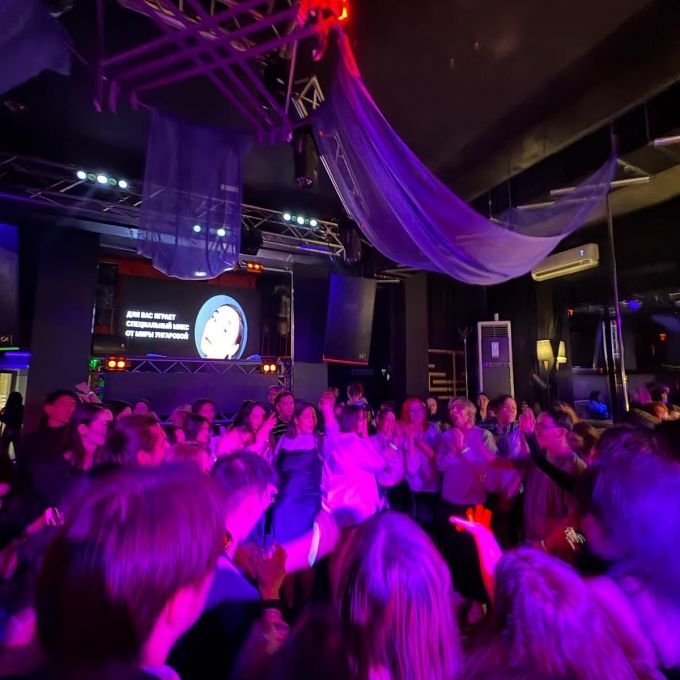 Young people dancing and moshing in Amirovki, a gay friendly bar in Almaty