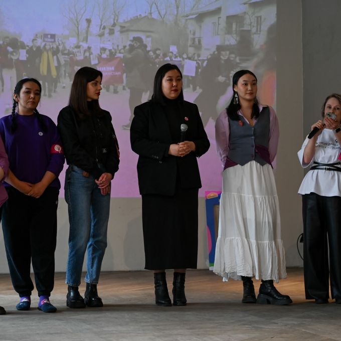 Women gather for the March 8 rally in Almaty inside a building because authorities refused to sanction a march.
