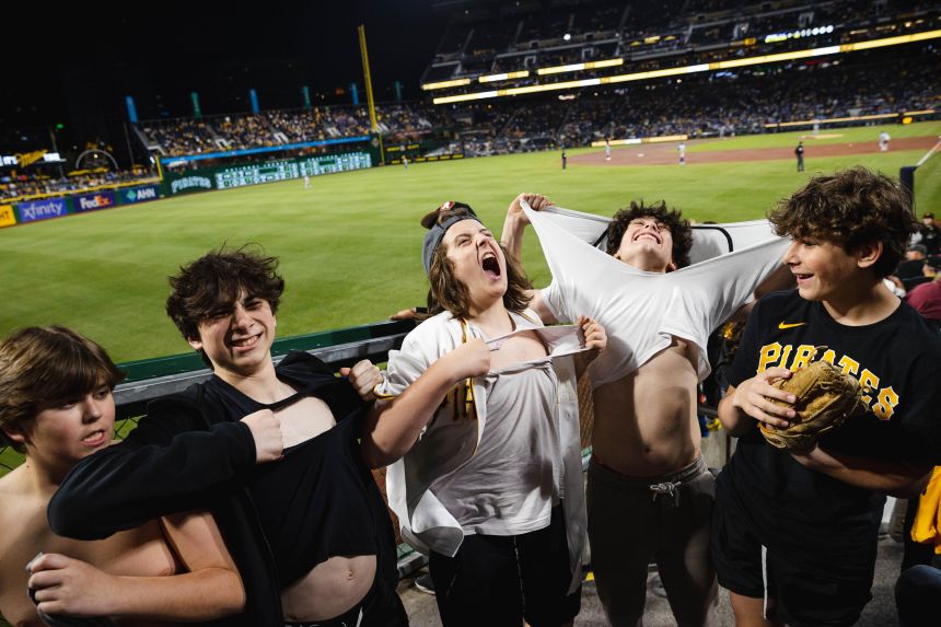 Pirates fans rip shirts