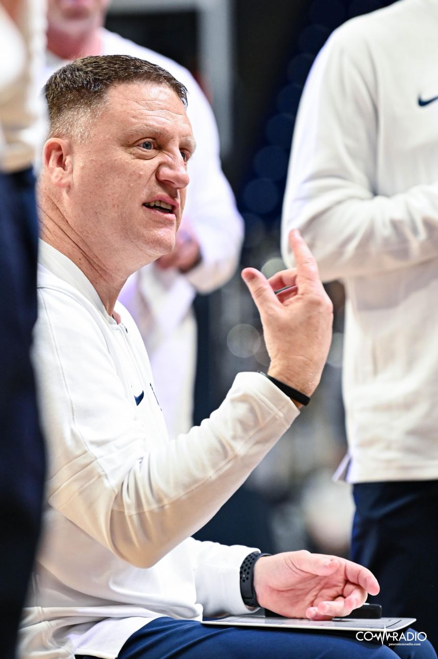 Mike Rhoades talking to his team during the game against Northwestern