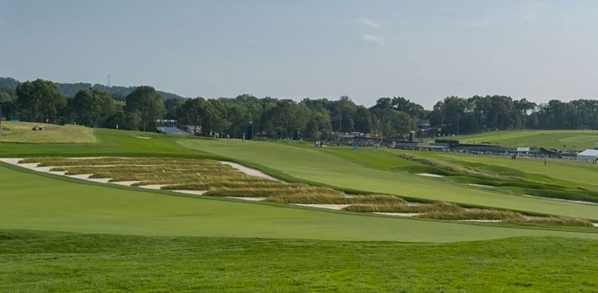 A green golf course fairway